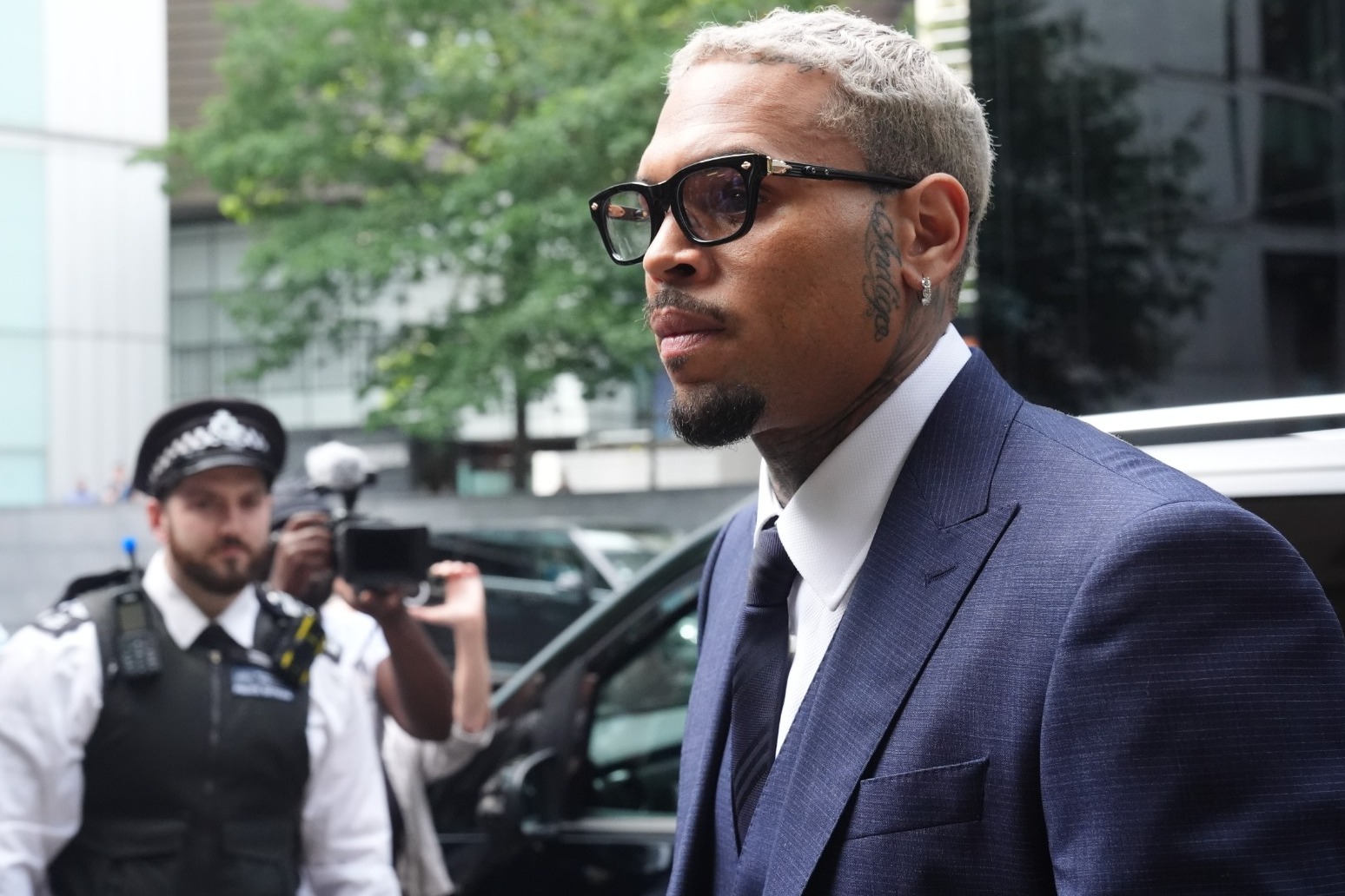 Chris Brown pleads not guilty to bottle attack charge