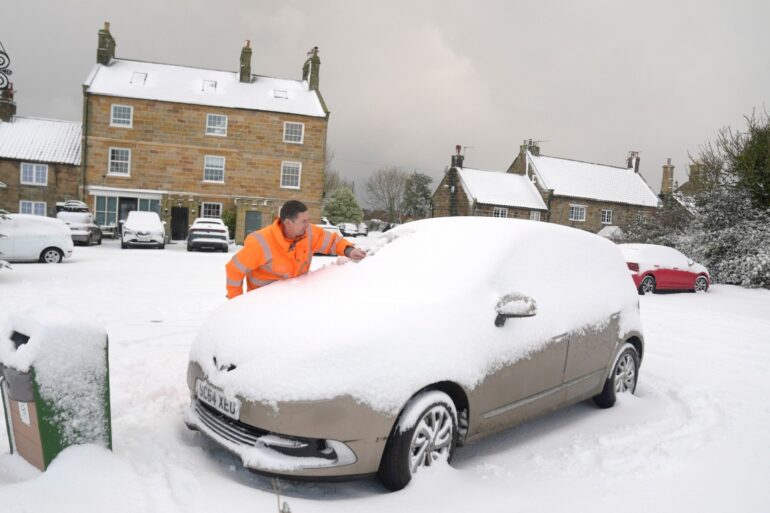 Travel Disruption And Freezing Temperatures As Snow And Ice Warnings Hit UK